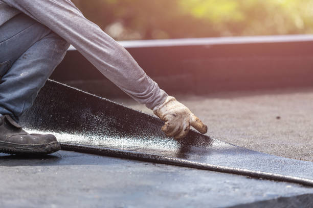 Professional Waterproofing technician working in Clarksville, MI